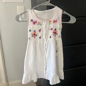 Summer dress with traditional HAND sewn detail and stitching.